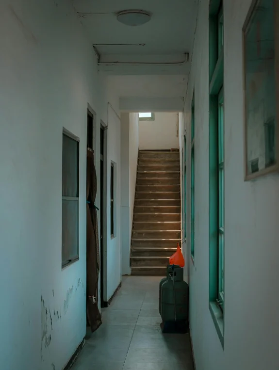 Paint and Light Tricks That Make a Narrow Hallway Feel Wider
