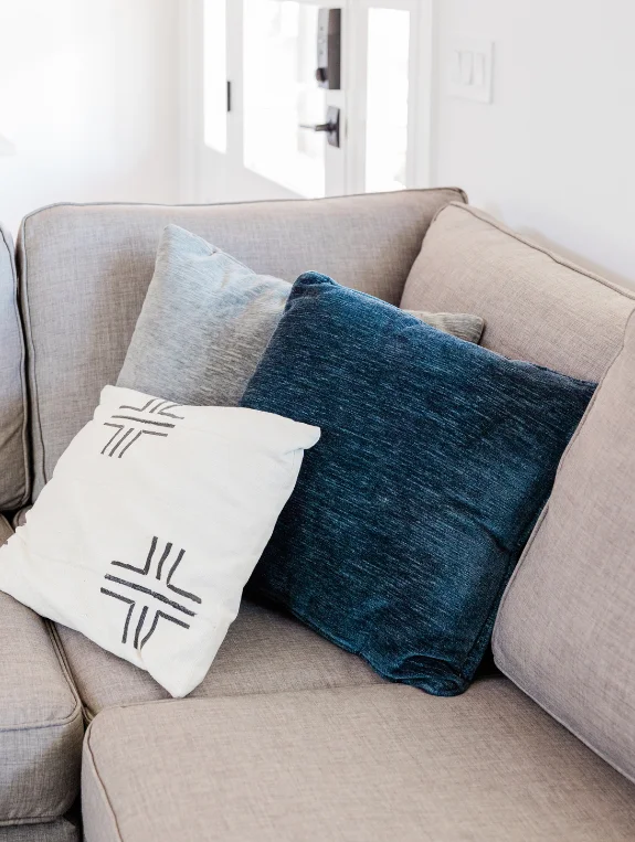 Mistake 1 — Throw Pillow Chaos That Costs a Fortune and Looks Cluttered