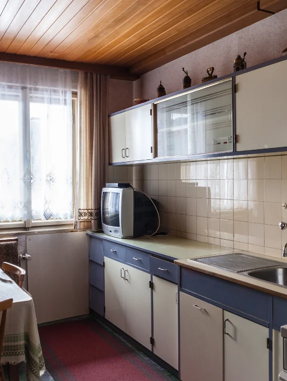 Strategy 3 — The Hidden Storage That Looks Like Normal Cabinets