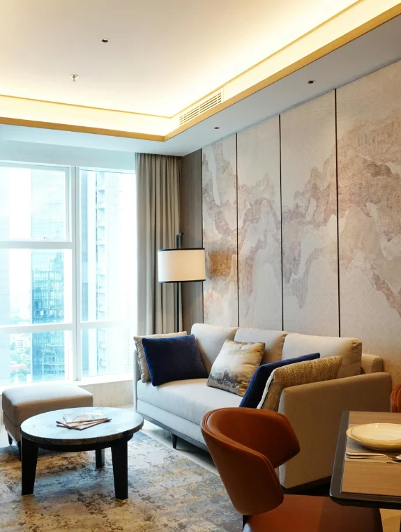 The Ceiling-Mounted Curtain Trick That Makes Studios Feel Bigger Not Smaller